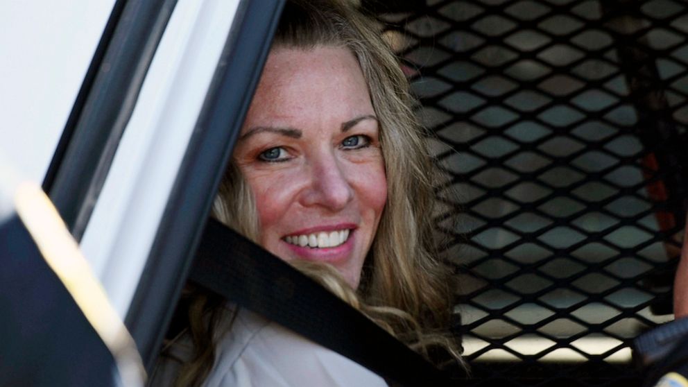 PHOTO: Lori Vallow Daybell sits in a police car after a hearing at the Fremont County Courthouse in St. Anthony, Idaho, on Aug. 16, 2022.