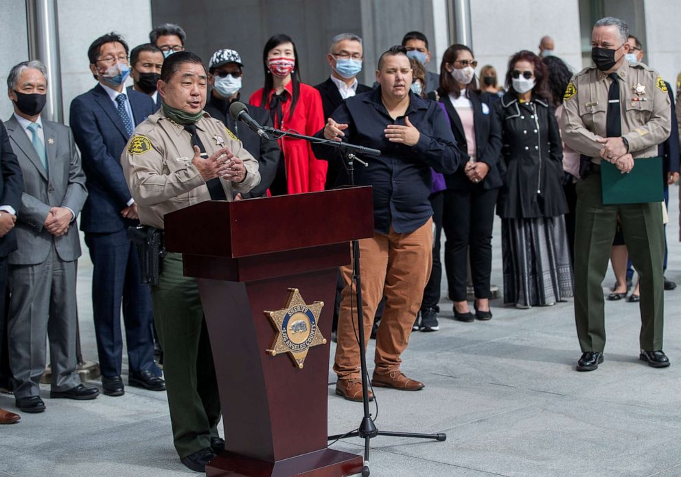 PHOTO: Los Angeles County Undersheriff Tim Murakami, left, speaks at a press conference in Los Angeles with members of local Asian community groups in a show of support for the local Asian American and Pacific Islander community, March 25, 2021.