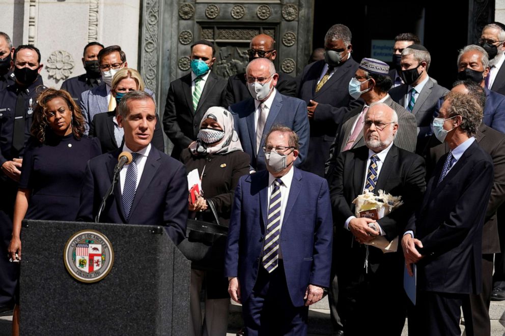 PHOTO: Los Angeles Mayor Eric Garcetti speaks in front of civic and faith leaders outside City Hall in Los Angeles, on May 20, 2021, calling for peace in the wake of violence in the city that is being investigated as potential hate crimes.