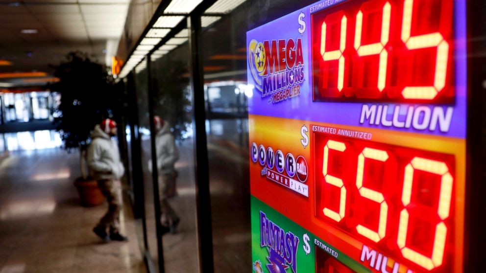 A sign advertises Powerball and Mega Millions lottery jackpots at a store in Atlanta, Georgia, Jan. 4, 2018.