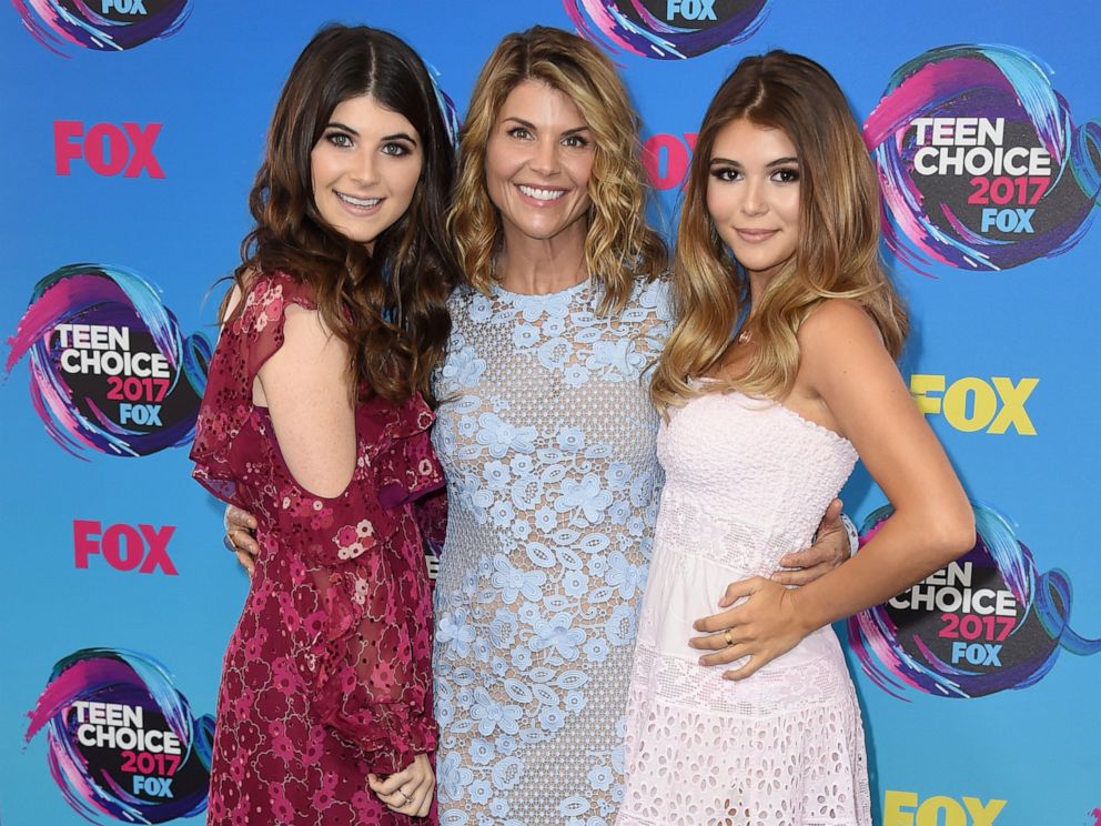 PHOTO: In this Aug. 13, 2017 file photo, actress Lori Loughlin, center, poses with her daughters Bella, left, and Olivia Jade at the Teen Choice Awards in Los Angeles. 