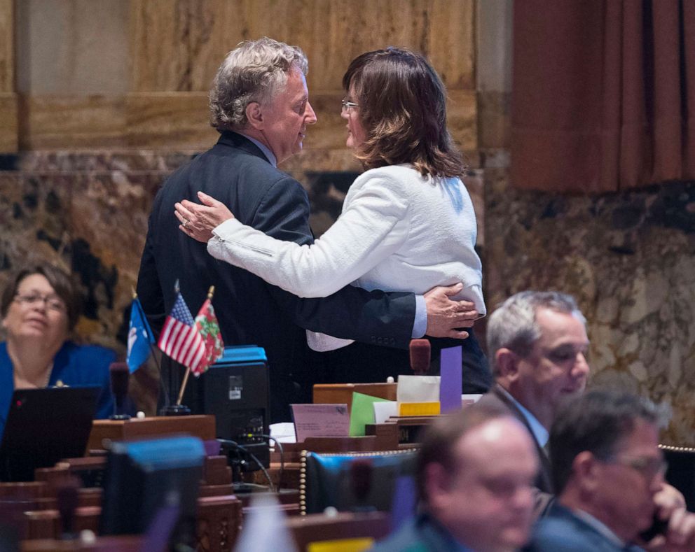 PHOTO: Sen. John Milkovich, left, and Rep. Valarie Hodges embrace in the House Chamber at the State Capitol, after the House passed Milkovich's 'fetal heartbeat' bill on Wednesday, May 29, 2019, in Baton Rouge, La. 