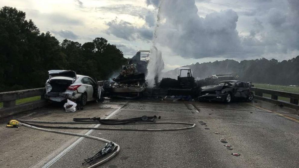 Four people were killed and 13 injured in a fiery crash near Covington, Louisiana, on Saturday, May 26, 2018.