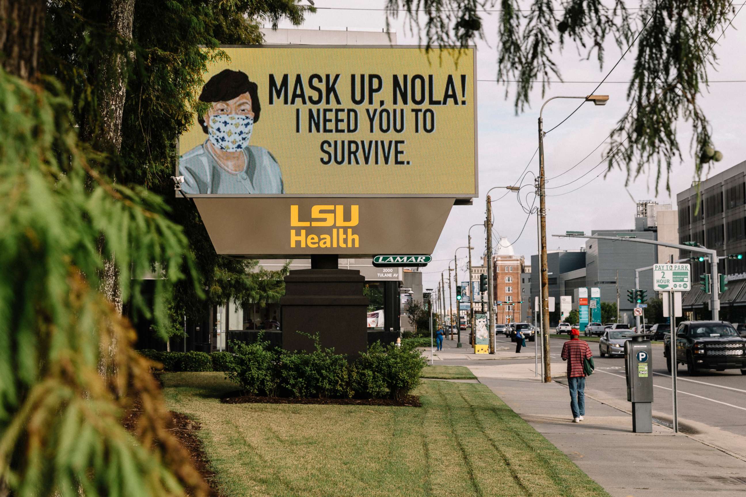 PHOTO: An electronic message board displays a rendering of New Orleans Mayor Latoya Cantrell wearing a face mask, along with a message to mask up, at the Louisiana State University Medical Center in New Orleans, July 28, 2020.