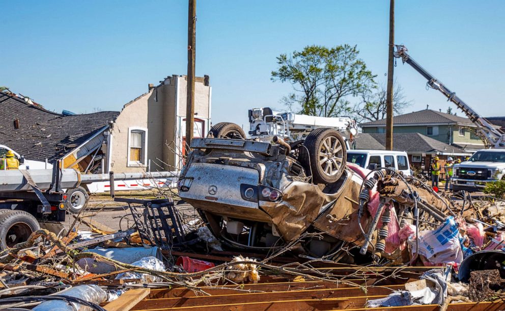 PHOTO: A car flipped upside down is seen after a tornado hit Arabi, New Orleans, La., March 23, 2022.