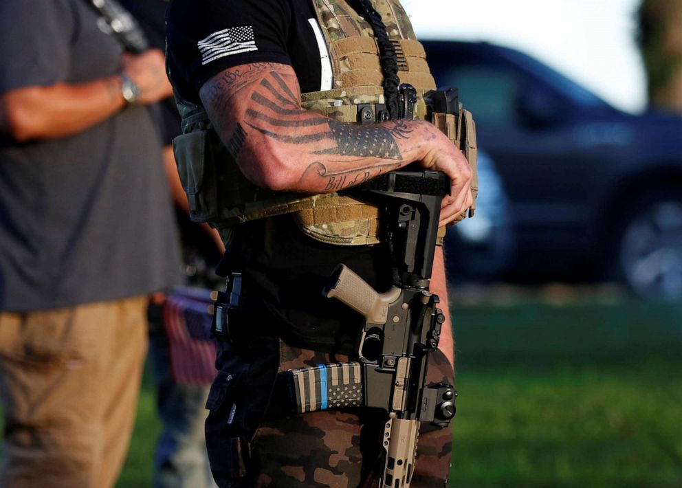 PHOTO: Far-right activist and self-described militia members gather for a rally on the day of the Kentucky Derby horse race in Louisville, KY., Sept. 5, 2020.