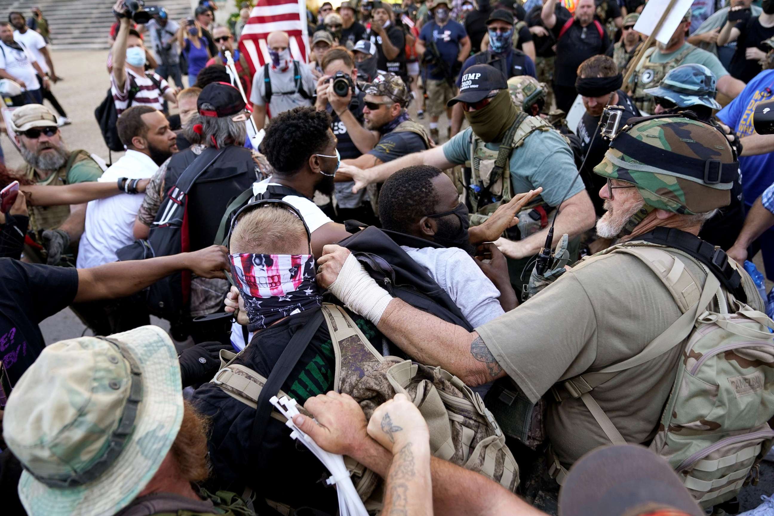 PHOTO: Far-right activists and self-described militia members and Black Lives Matter activists scuffle on the day of the Kentucky Derby horse race in Louisville, Ky., Sept. 5, 2020.