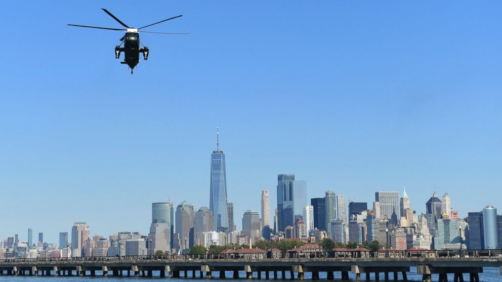 PHOTO: Marine One, with President Donald Trump on board, flies past the Manhattan skyline as it heads to the Liberty Park landing zone in Jersey City, N.J., Sunday, Oct. 1, 2017.