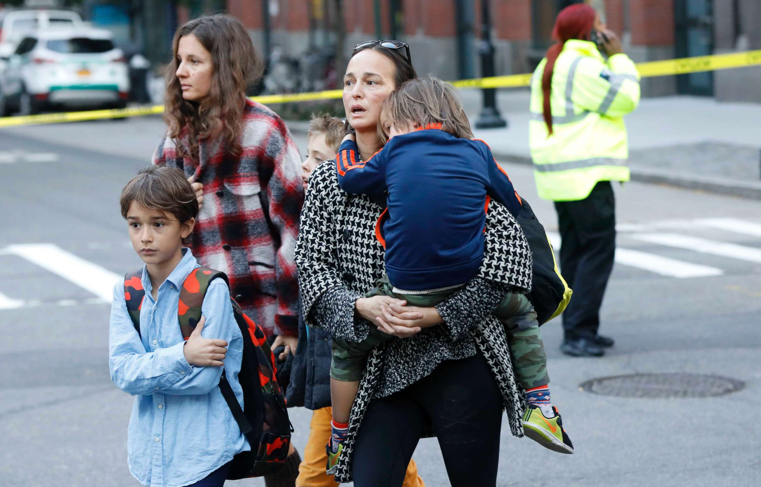 PHOTO: Parents pick up their children from P.S./I.S.-89 school after a shooting incident in New York City, Oct. 31, 2017.