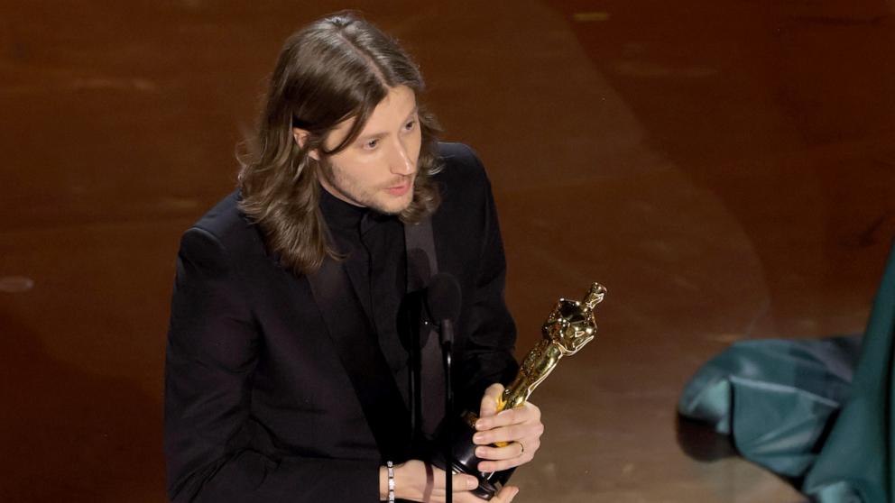 PHOTO: Ludwig Göransson accepts the Best Original Score for "Oppenheimer" onstage during the 96th Annual Academy Awards, March 10, 2024, in Hollywood.