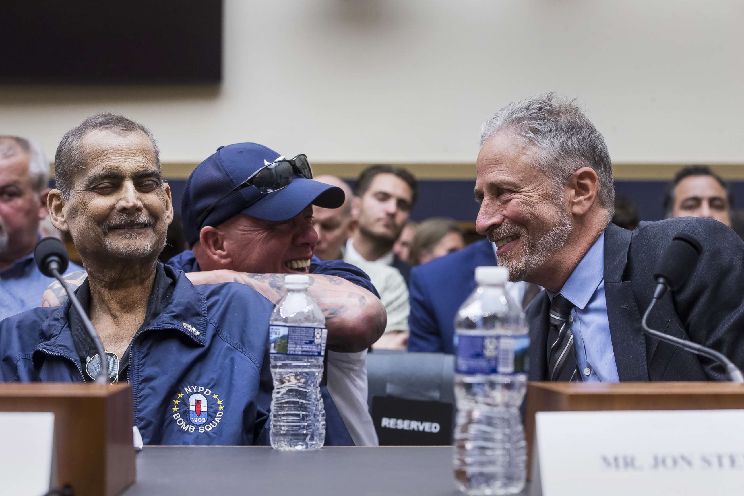 PHOTO: Former Daily show host Jon Stewart, right, speaks to retired police detective and 9/11 responder Luis Alvarez, left, during a hearing on reauthorization of the September 11th Victim Compensation Fund, June 11, 2019, in Washington, D.C.