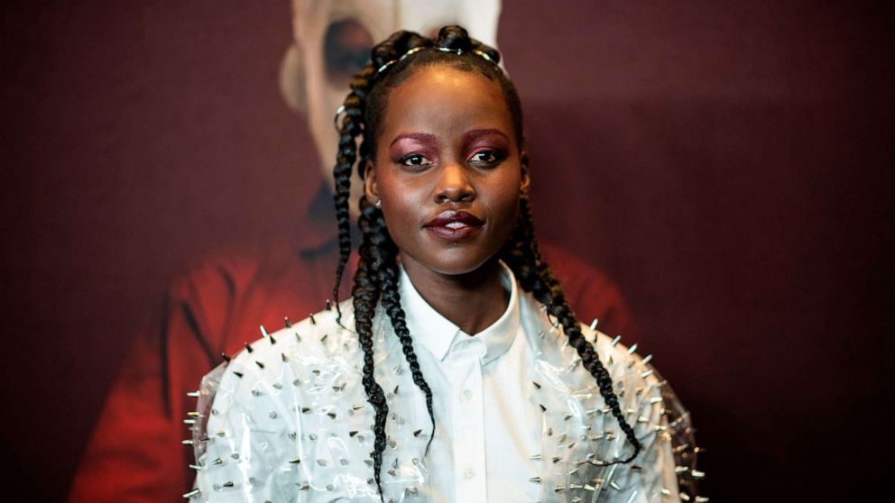 PHOTO: Lupita Nyong'o arrives for the New York premiere of "US" at the Museum of Modern Art, March 19, 2019, in New York.