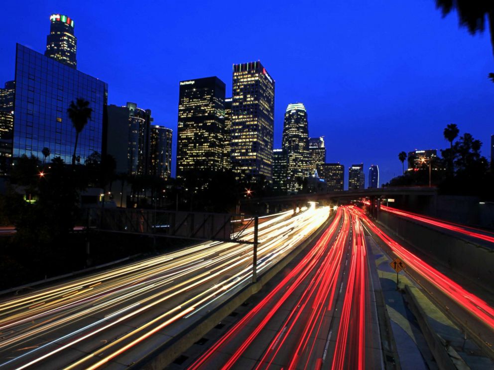 PHOTO: A long exposure shows motorists commuting during the evening rush hour on the 110 Freeway in downtown Los Angeles, December 2014.