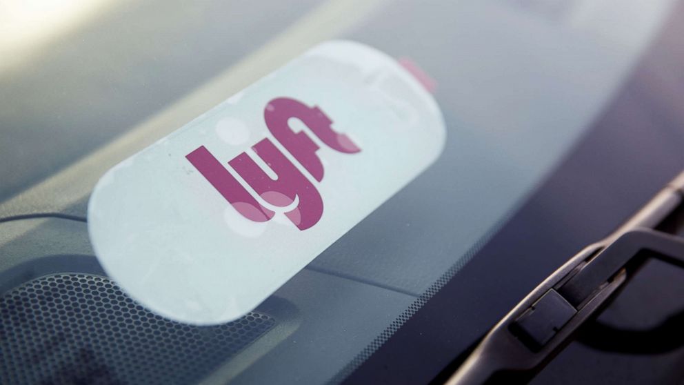 A Lyft Inc. decal is displayed on a car window in Los Angeles in this Nov. 13, 2017 file photo.