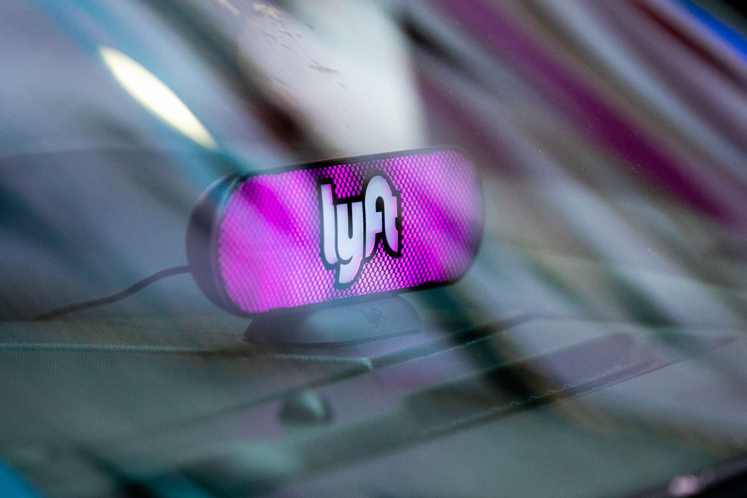 PHOTO: A Lyft Inc. light sits on the dashboard of a vehicle in New York, May 8, 2019.