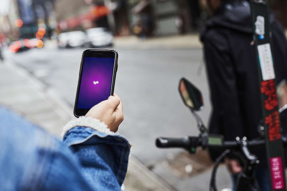 PHOTO: The Lyft Inc. application is displayed on an Apple Inc. iPhone in this arranged photograph taken in New York, New York, Feb. 24, 2019.