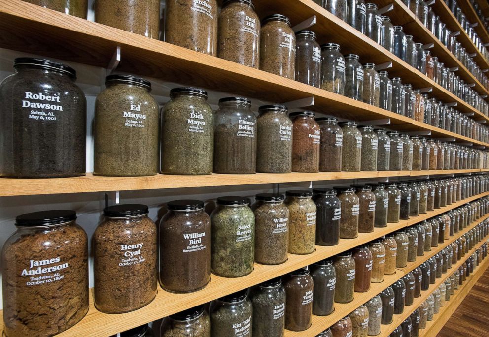 PHOTO: Jars containing soil from the sites of confirmed lynchings in the state of Alabama are displayed at the Equal Justice Initiative offices, April 13, 2018; Montgomery, Ala.