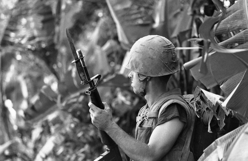 PHOTO: A U.S. Marine, a bayonet fixed to his M16 rifle, prepares to enter heavy undergrowth in search of Viet Cong Snipers in Vietnam, Dec. 30, 1967.