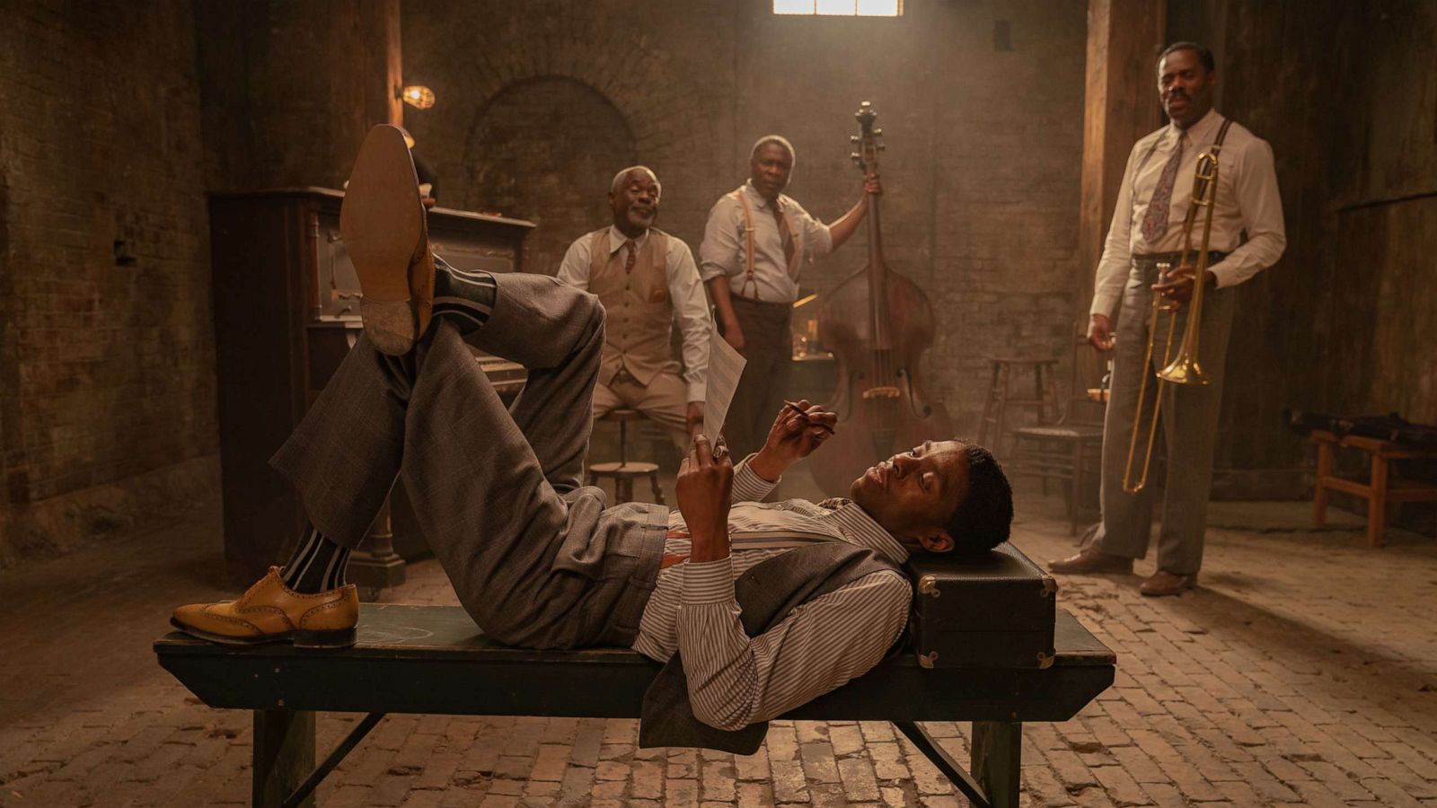 PHOTO: Chadwick Boseman as Levee, Glynn Turman as Toldeo, Michael Potts as Slow Drag, Colman Domingo as Cutler in the 2020 film, "Ma Rainey's Black Bottom."