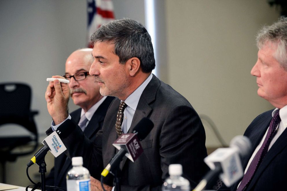 PHOTO: Dr. Paolo Macchiarini, center, holds a replica of a windpipe, that they claimed was bioengineered using plastic fibers and human stem cells, at a news conference at the Children's Hospital of Illinois, April 30, 2013.