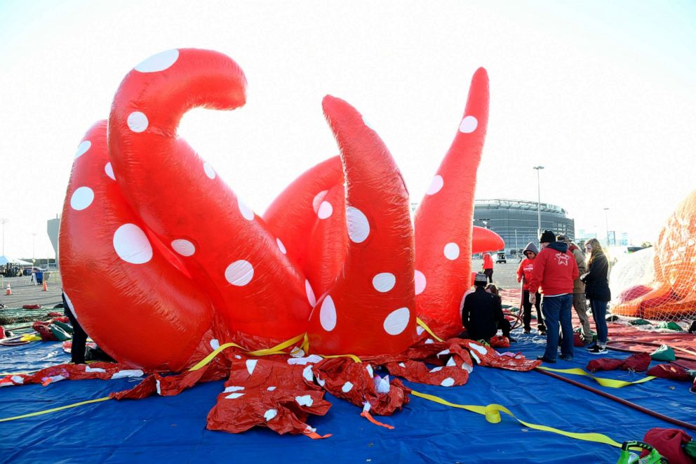 PHOTO: Workers inflate balloons as Macys unveils new giant character balloons for the 93rd annual Macys Thanksgiving Day Parade at MetLife Stadium, Nov. 2, 2019, in East Rutherford, N.J. 