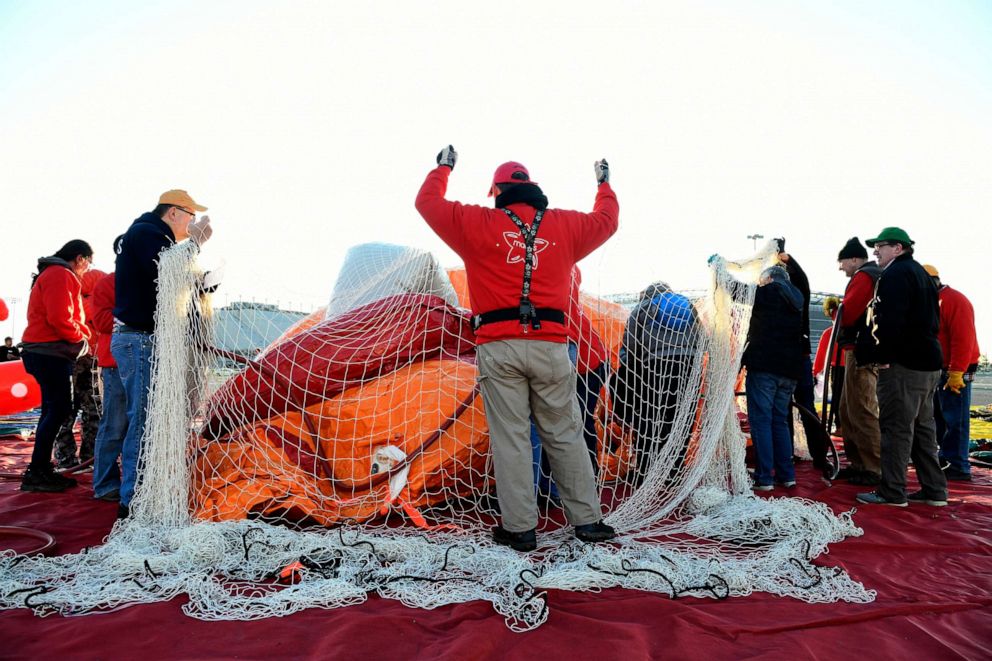 PHOTO: Workers inflate balloons as Macys unveils new giant character balloons for the 93rd annual Macys Thanksgiving Day Parade at MetLife Stadium, Nov. 2, 2019, in East Rutherford, N.J. 