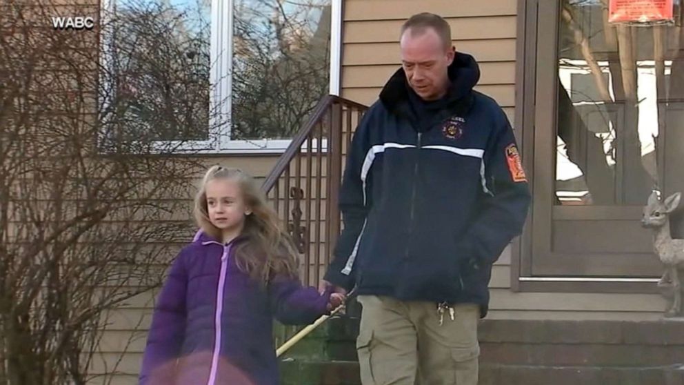 PHOTO: Madalyn Karlbon and her father speak with WABC about the recent fire at their home.