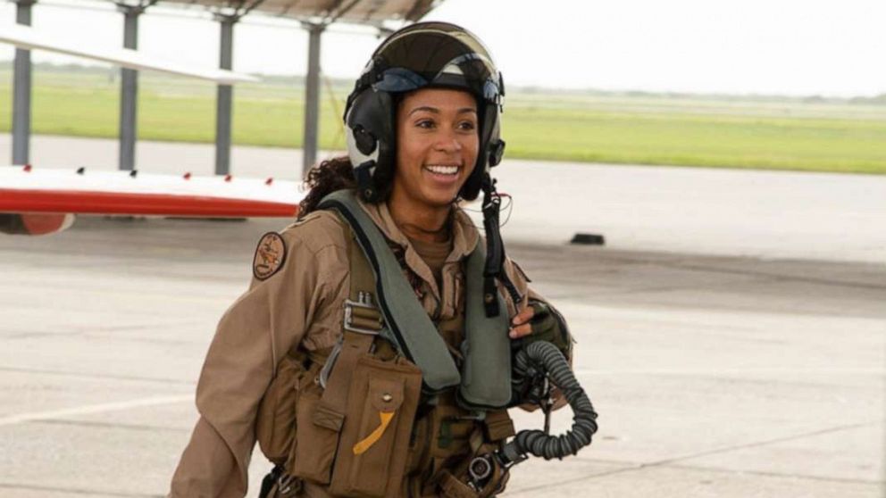 PHOTO: Lt j.g. Madeline Swegle, assigned to the Redhawks of Training Squadron (VT) 21 at Naval Air Station Kingsville, Texas, exits a T-45C Goshawk training aircraft, July 7, 2020.