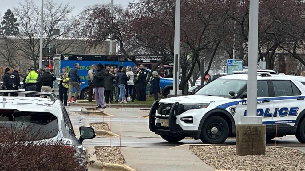 PHOTO: Emergency vehicles are parked outside of the SSM Health clinic where parents are being reunified with children after a shooting at the Abundant Life Christian School in Madison, Wis., Dec. 16, 2024. 