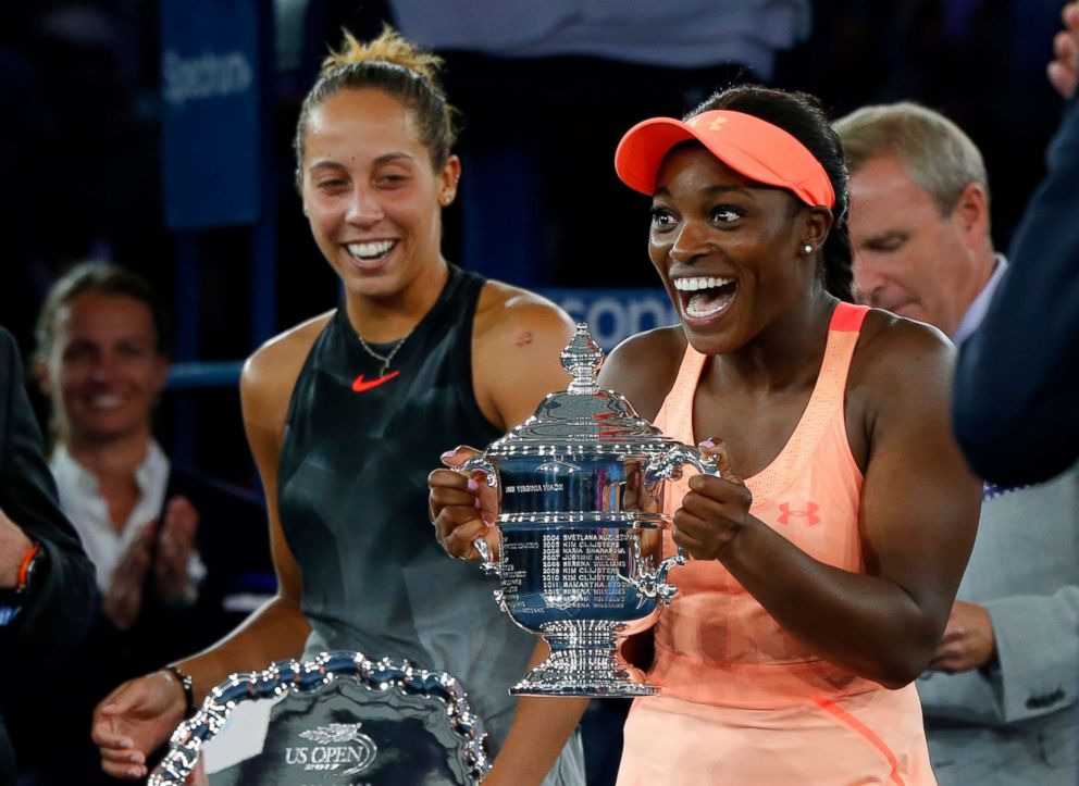 PHOTO: Sloane Stephens, right, reacts with the trophy after defeating  Madison Keys, left, in the US Open Women's Final in New York, Sept. 9, 2017.