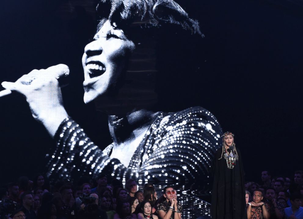 Madonna presents a tribute to Aretha Franklin, pictured on screen, at the MTV Video Music Awards at Radio City Music Hall on Monday, Aug. 20, 2018, in New York. 