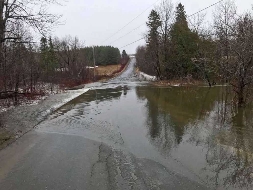 PHOTO: The Aroostook river floods  a road in Fort Fairfield, Maine, April 26, 2018, after heavy rains in the area.