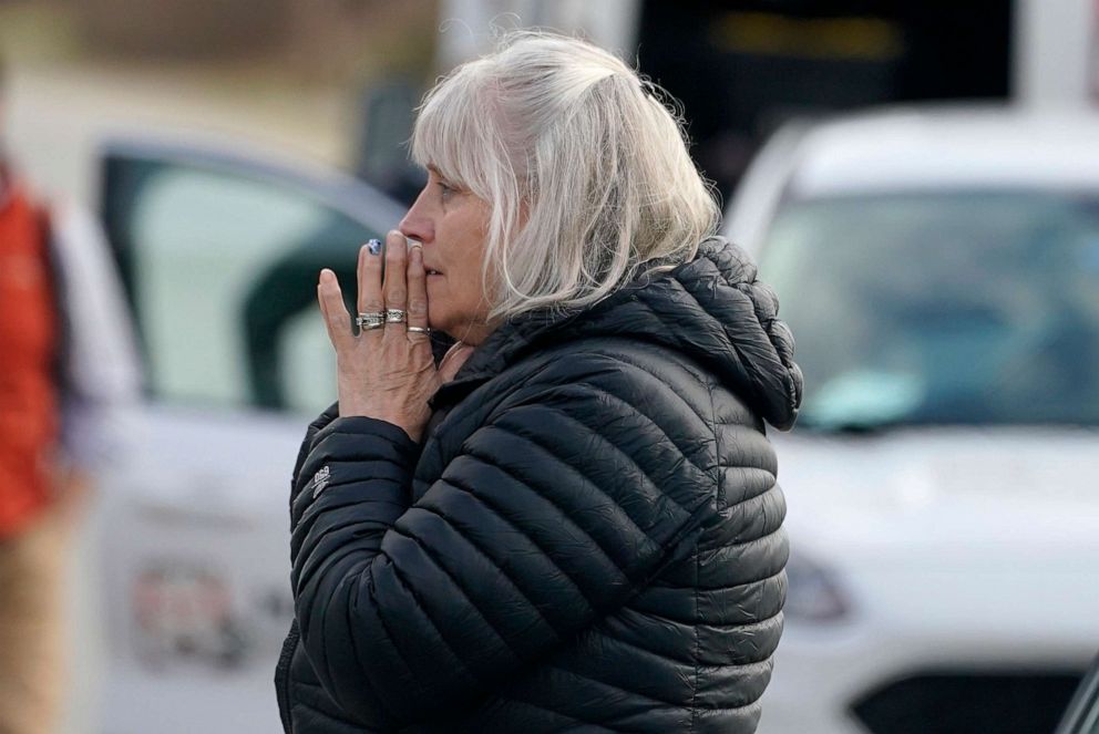 PHOTO: A woman reacts at the scene of a multiple shooting, April 18, 2023, in Bowdoin, Maine.