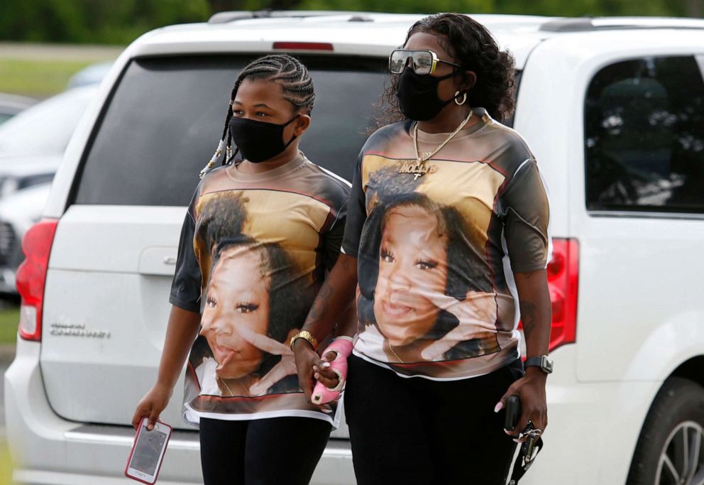 PHOTO: Mourners wearing shirts with Ma'Khia Bryant's picture, arrive for the funeral for the 16-year-old at the First Church of God in Columbus, Ohio, April 30, 2021.