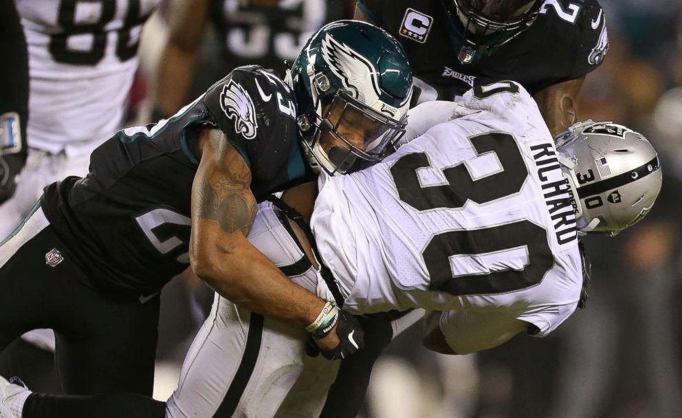 PHOTO: Rodney McLeod #23 of the Oakland Raiders is grabbed by Malcolm Jenkins #27 of the Philadelphia Eagles during a game on Dec. 25, 2017, in Philadelphia.