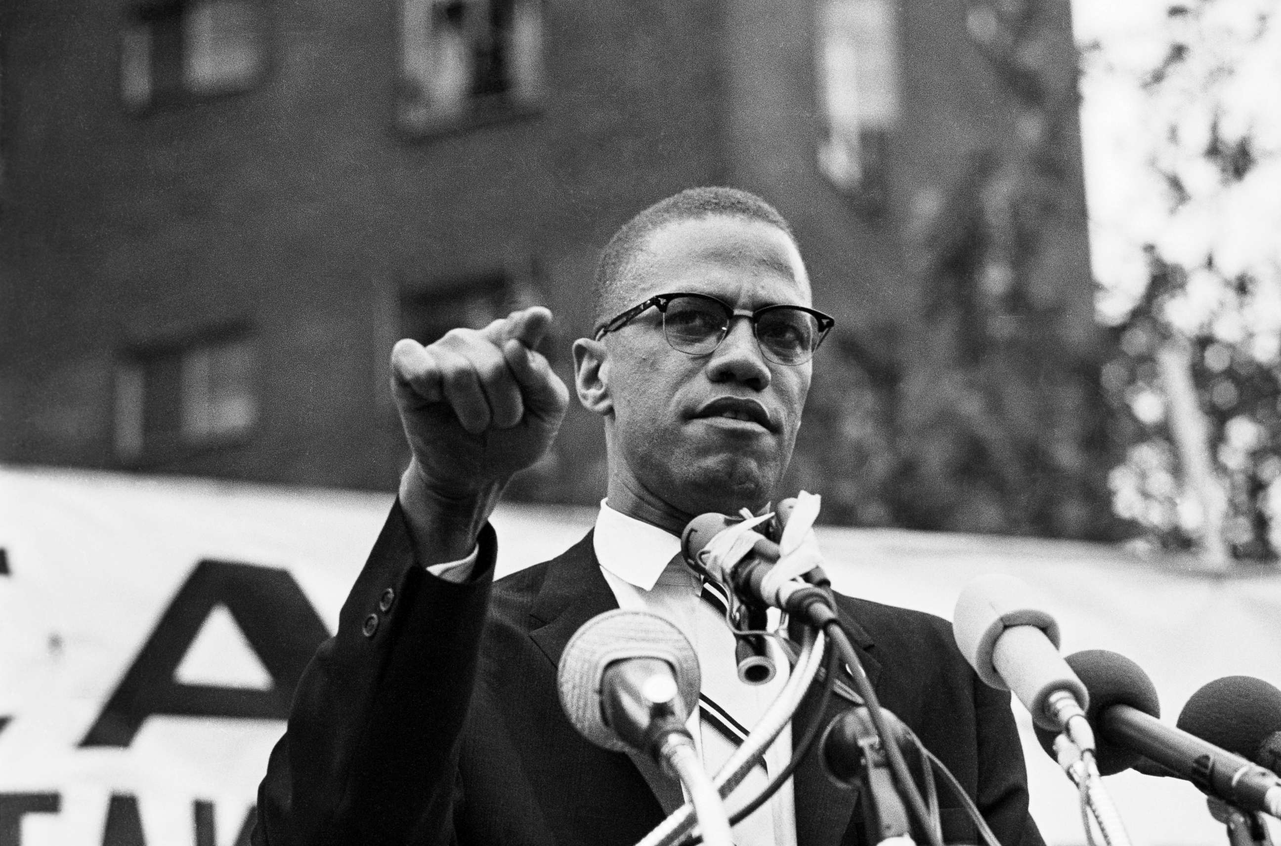 PHOTO: Malcolm X gestures during a speech at a rally.