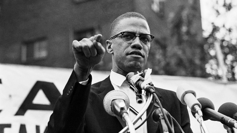 PHOTO: Malcolm X gestures during a speech at a rally.