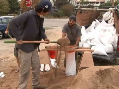Californians prepare for possible mudslides as rain hits wildfire-affected regions