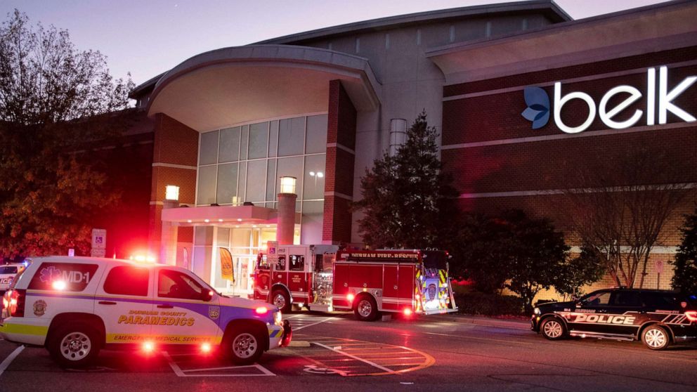 PHOTO: Emergency vehicles congregate around the entrance to Belk at Southpoint Mall in Durham, N.C. after three people, including a 10-year-old, were wounded in an afternoon shooting on Black Friday, Nov. 26, 2021. 