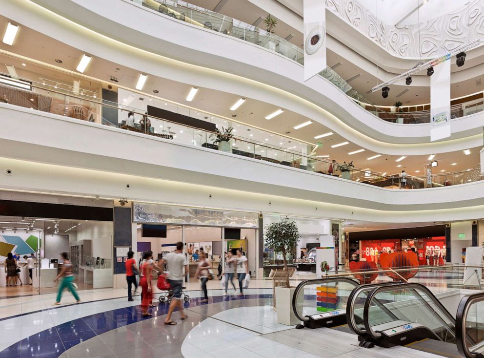 PHOTO: Shoppers are pictured a a mall (shopping center)