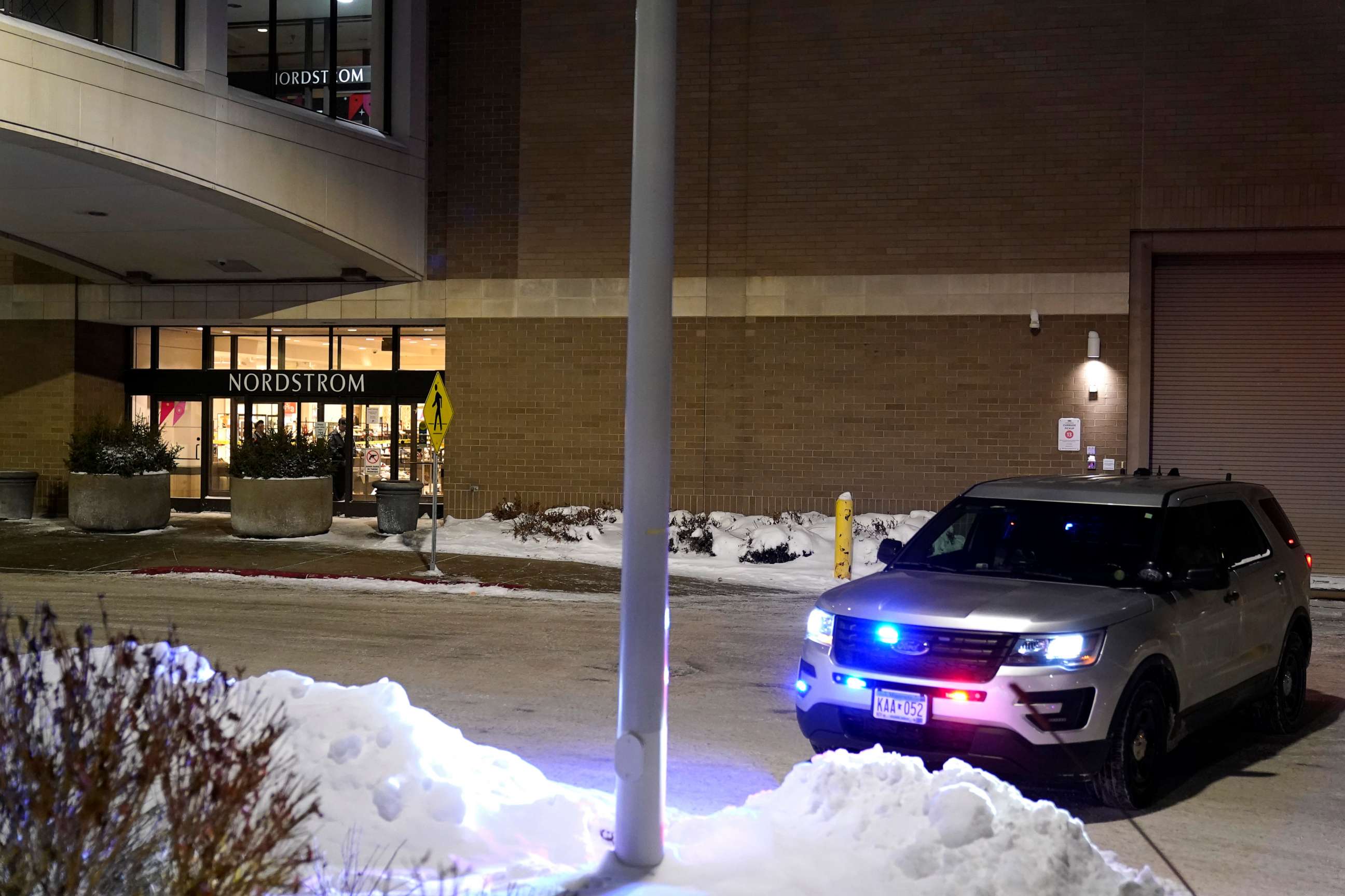 PHOTO: A police car sits parked outside Nordstrom at Mall of America after a shooting Friday, Dec. 23, 2022, in Bloomington, Minn.