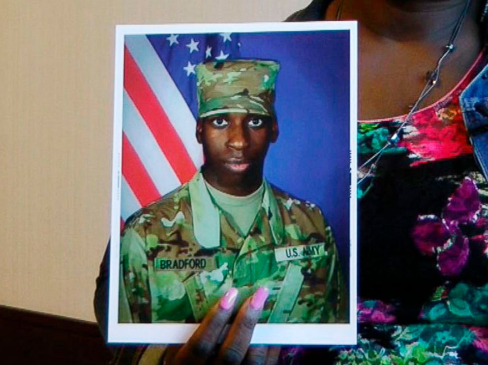 PHOTO: In this still image taken from video, April Pipkins holds a photograph of her deceased son, Emantic EJ Bradford Jr., during an interview in Birmingham, Ala., on Nov. 27, 2018.