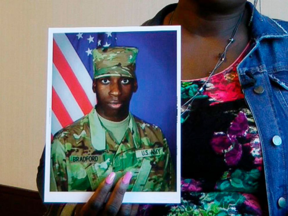 PHOTO: In this still image taken from video, April Pipkins holds a photograph of her deceased son, Emantic "EJ" Bradford Jr., during an interview in Birmingham, Ala., on Nov. 27, 2018.