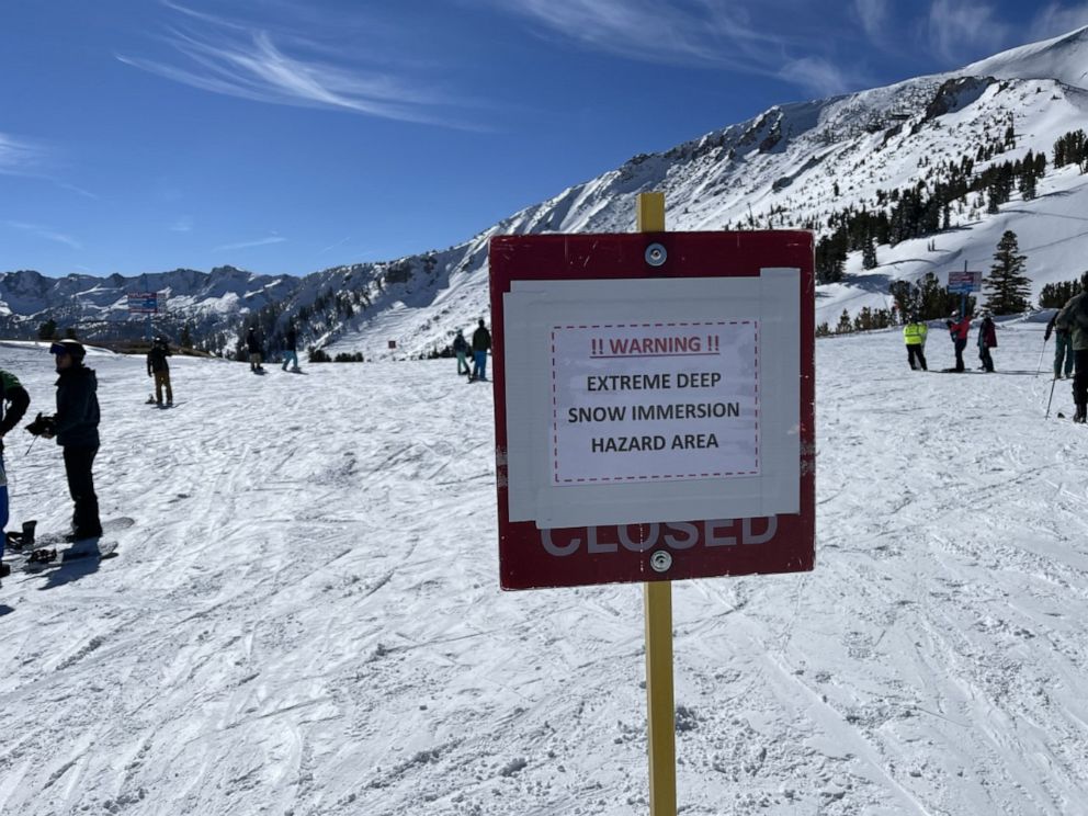 PHOTO: A sign at Mammoth Mountain in California warns skiers of a snow immersion risk on Jan. 30, 2021, two days after a skier died getting buried in over 7 feet of snow.