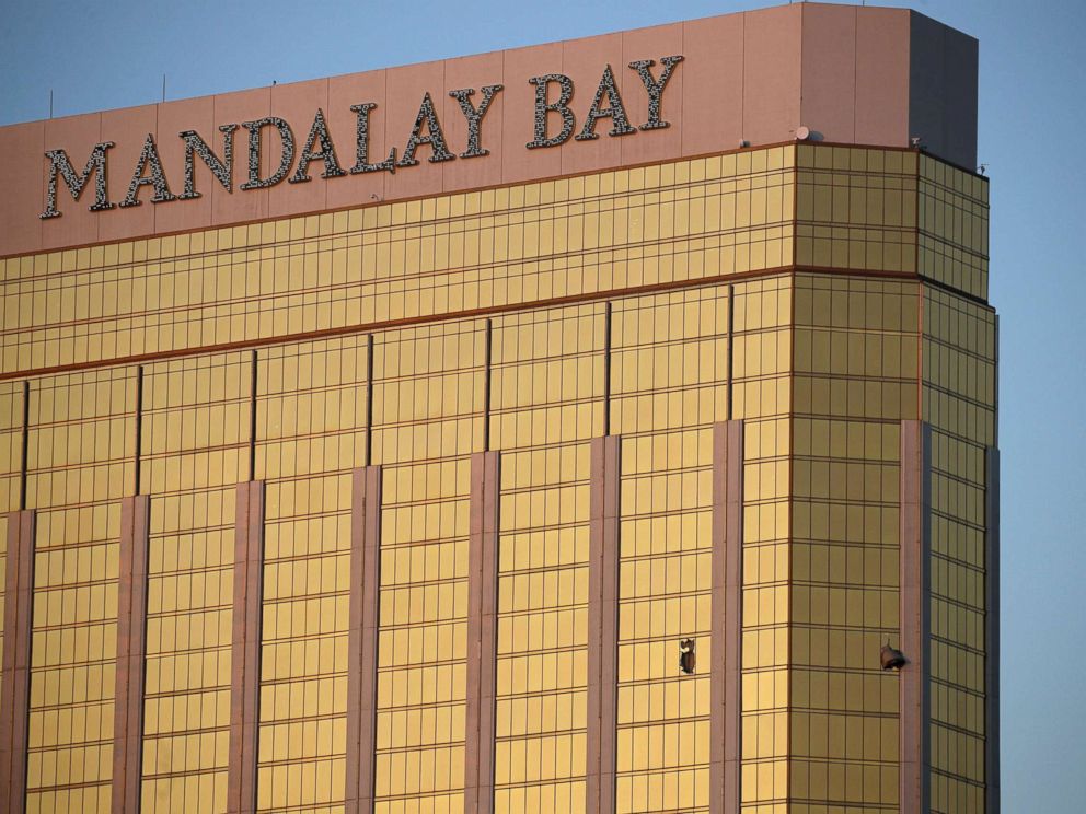 PHOTO: Drapes billow out of broken windows at the Mandalay Bay resort and casino on the Las Vegas Strip, Oct. 2, 2017, following a deadly shooting at a music festival.
