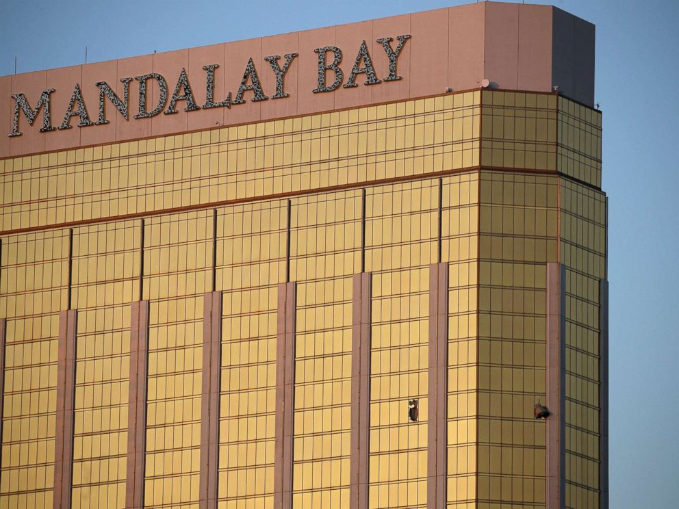 PHOTO: Drapes billow out of broken windows at the Mandalay Bay resort and casino on the Las Vegas Strip, Oct. 2, 2017, following a deadly shooting at a music festival.