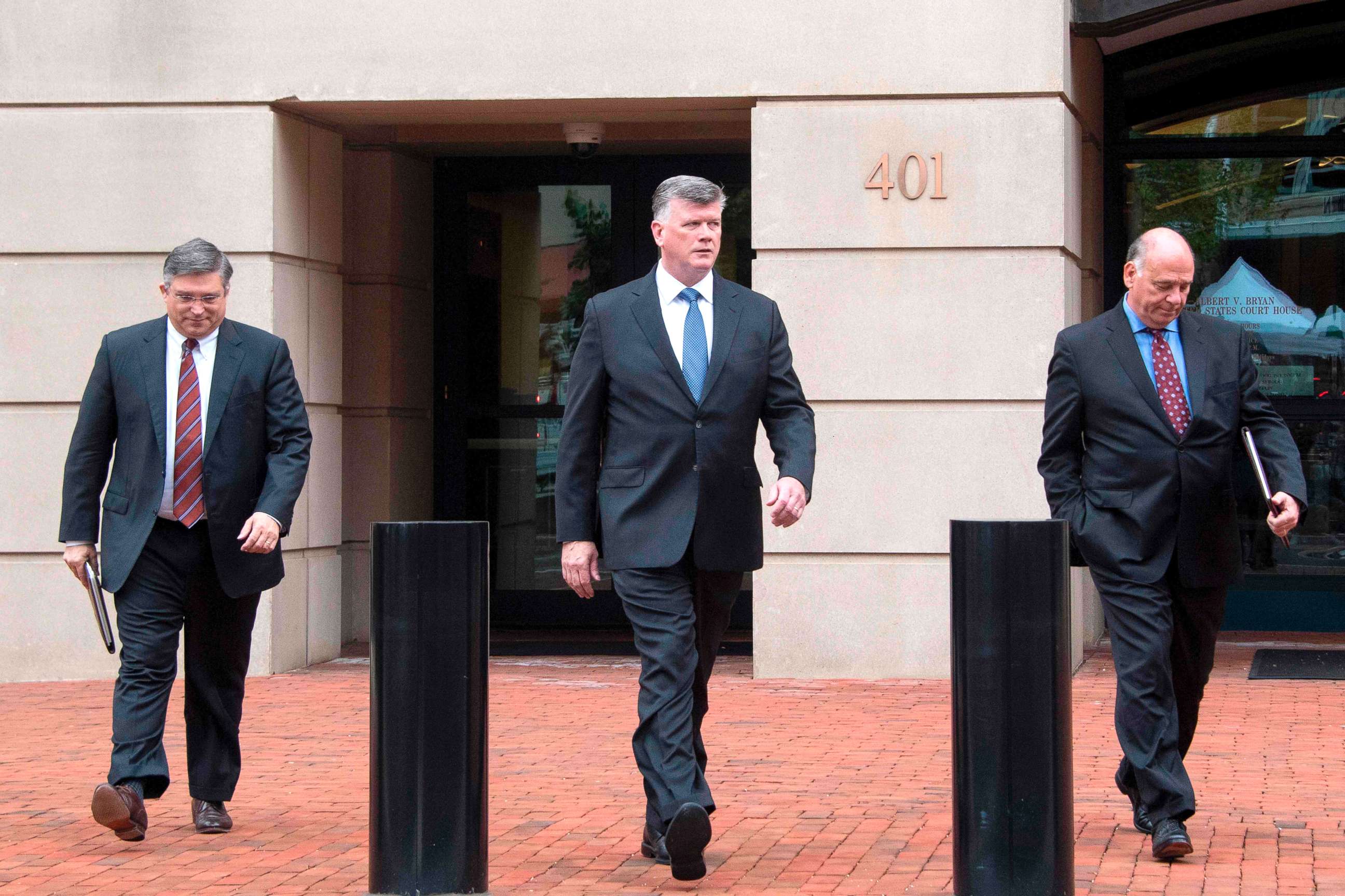 PHOTO: The defense attorneys for former Trump campaign manager Paul Manafort, including lead attorney Kevin Downing (C), Richard Westling (L) and Thomas Zehnle (R), depart the US Courthouse in Alexandria, Va., Aug. 21, 2018.