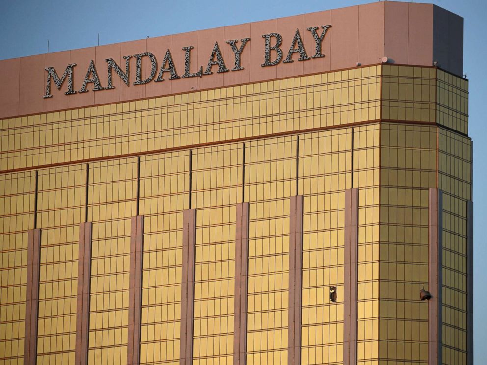 PHOTO: Drapes billow out of broken windows at the Mandalay Bay resort and casino, Oct. 2, 2017, on the Las Vegas Strip following a deadly shooting at a music festival in Las Vegas.