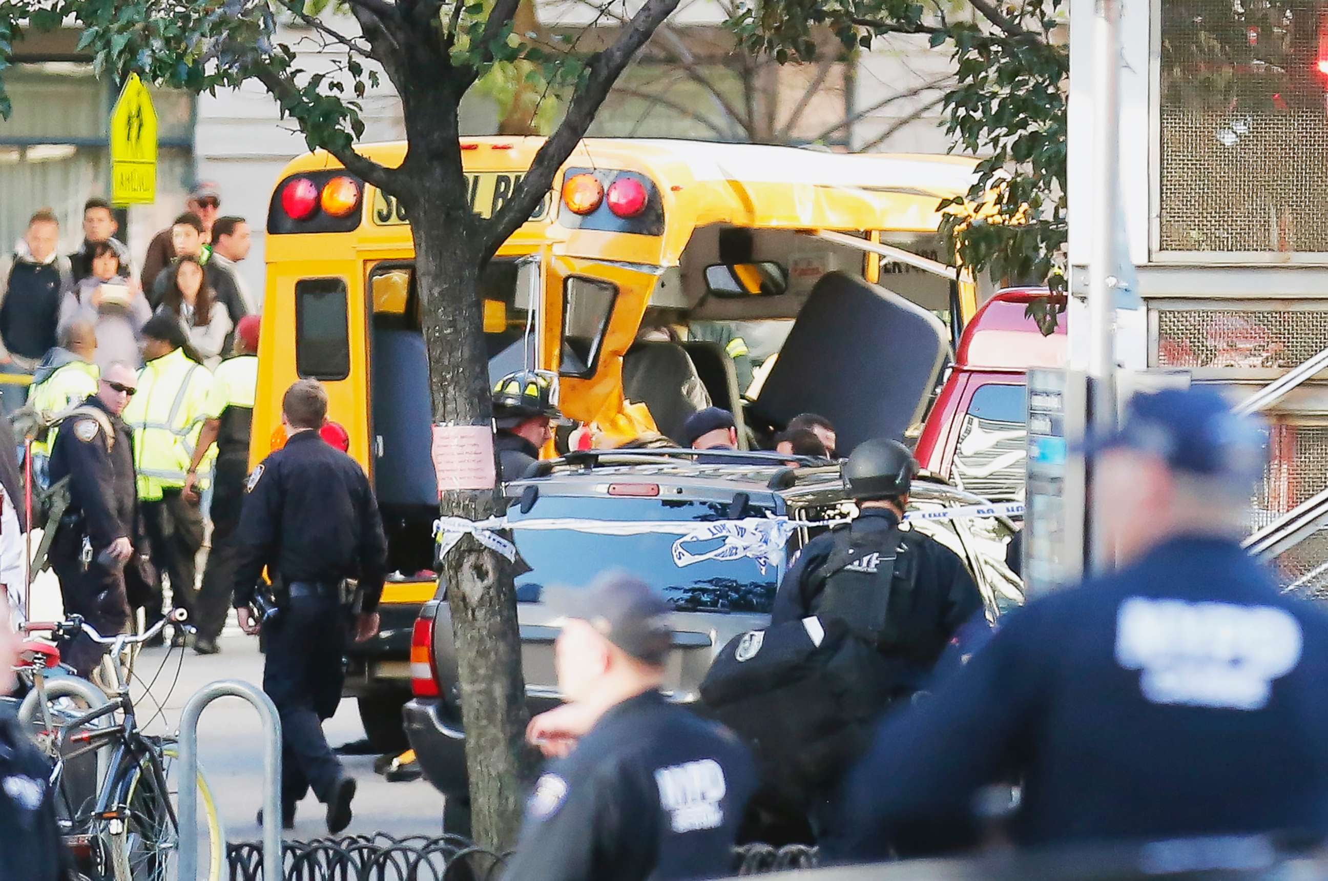 PHOTO: Authorities respond near a damaged school bus, Oct. 31, 2017, in New York.
