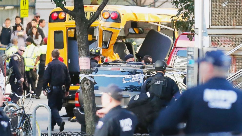 PHOTO: Authorities respond near a damaged school bus, Oct. 31, 2017, in New York.